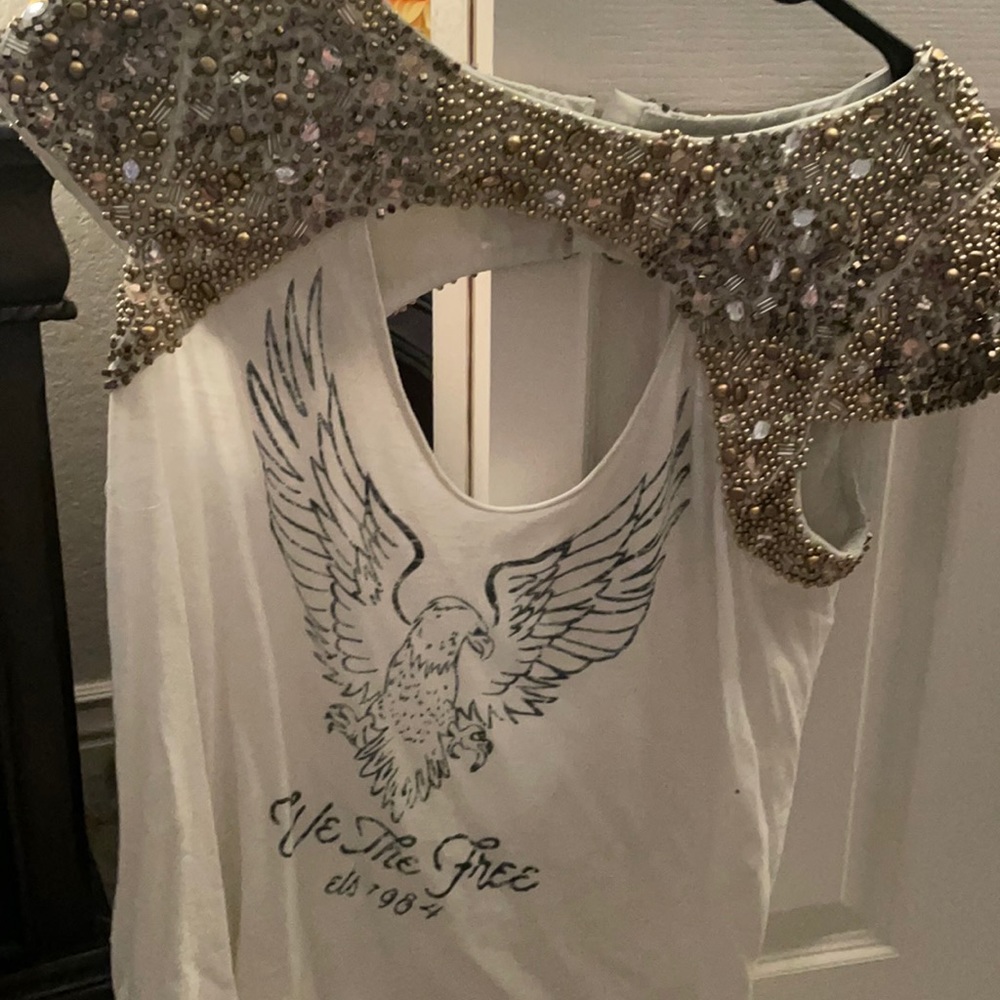 Free People. Sequin t-shirt Always sold out. Super cute!
